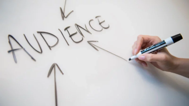 2. Implement Healthcare SEO for Your Website Person writing on white paper
