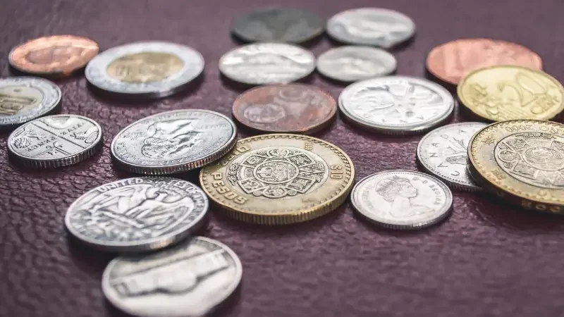 Round gold-colored and silver-colored coins