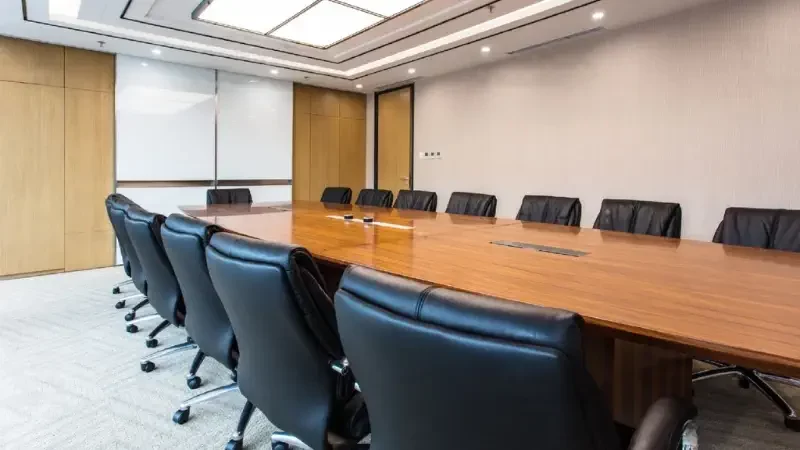 An empty meeting room and conference table